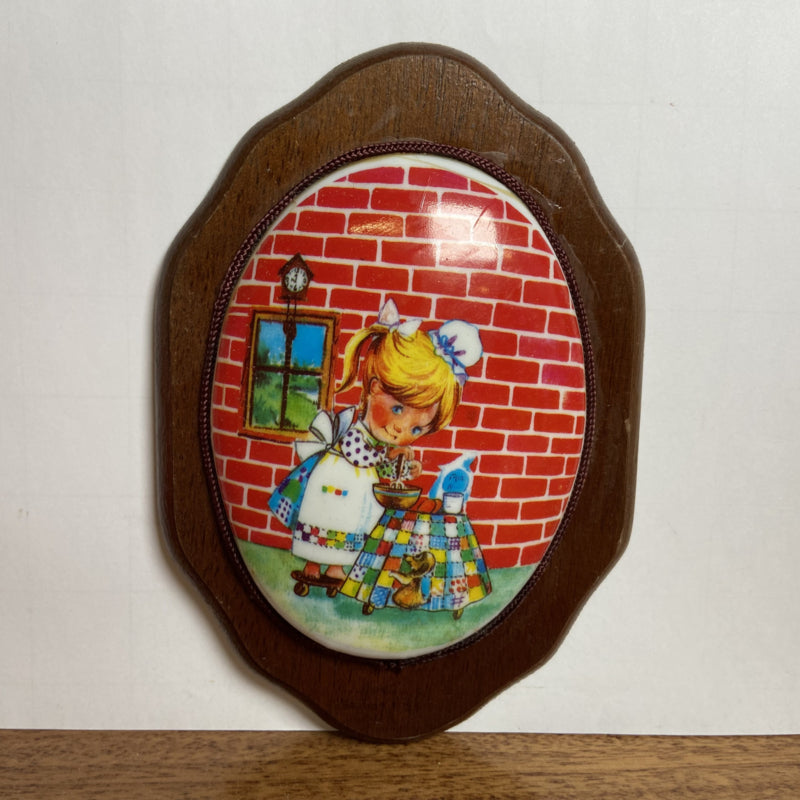 Vintage kunststof wandbordje