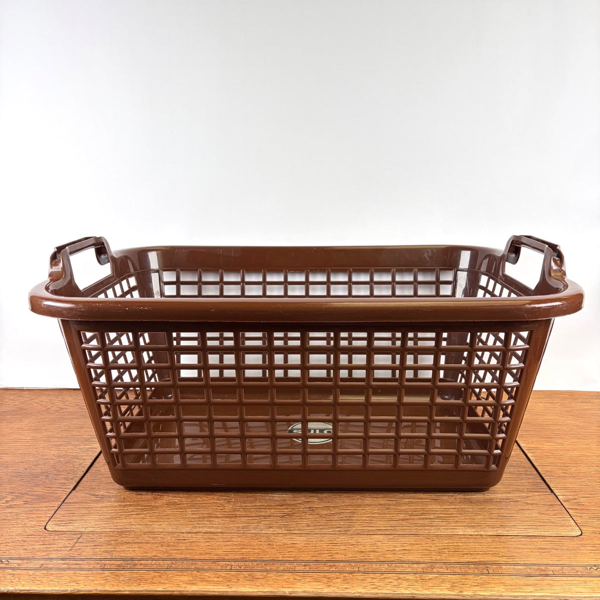 Vintage bruine plastic wasmand Sulo