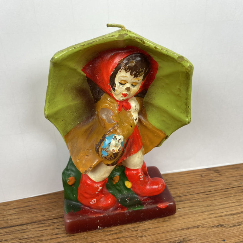 Vintage kaars meisje met paraplu