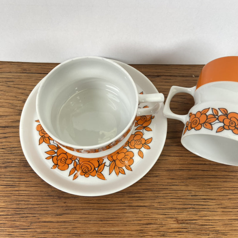 Setje vintage kop en schotel oranje