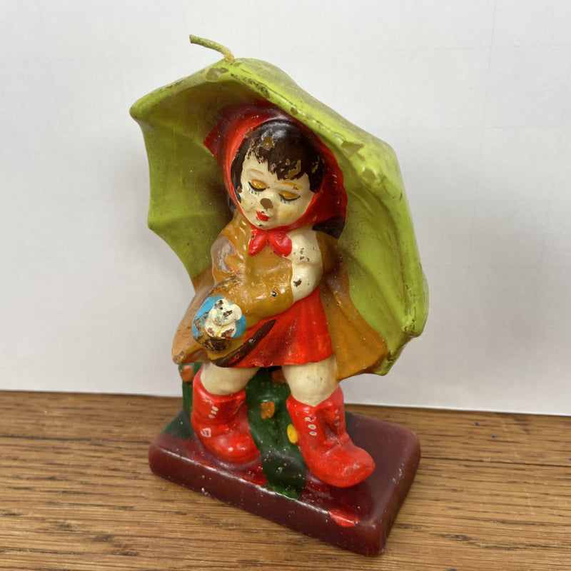 Vintage kaars meisje met paraplu