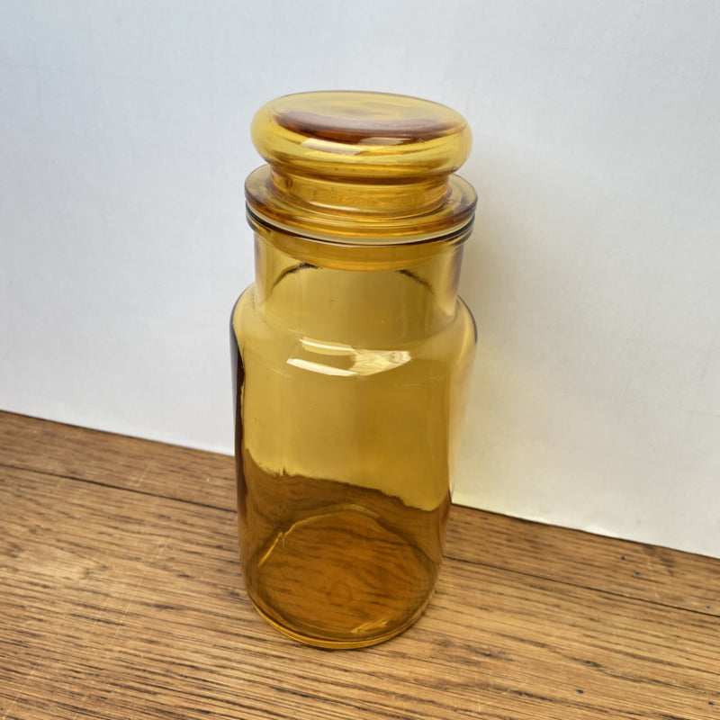 Okergele stopfles