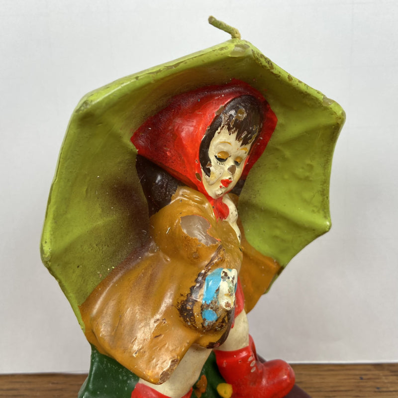 Vintage kaars meisje met paraplu