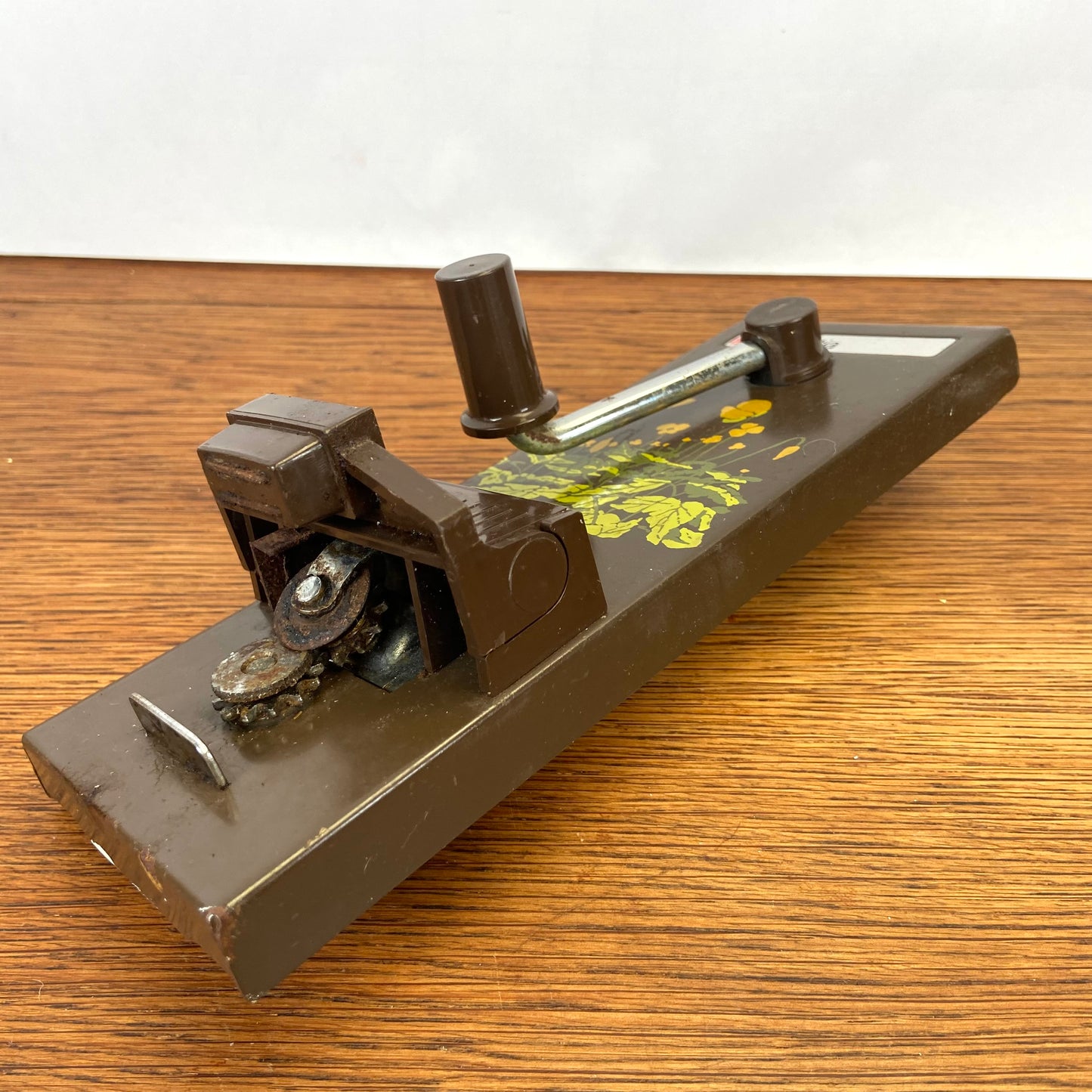 Vintage blikopener Brabantia boterbloem