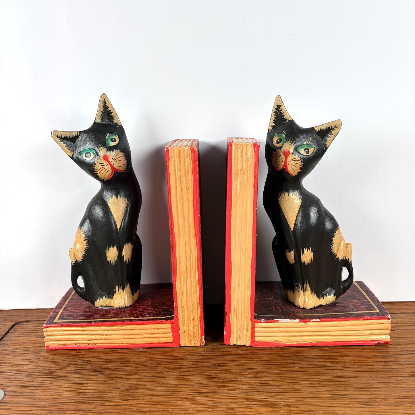 Vintage houten boekensteunen katten