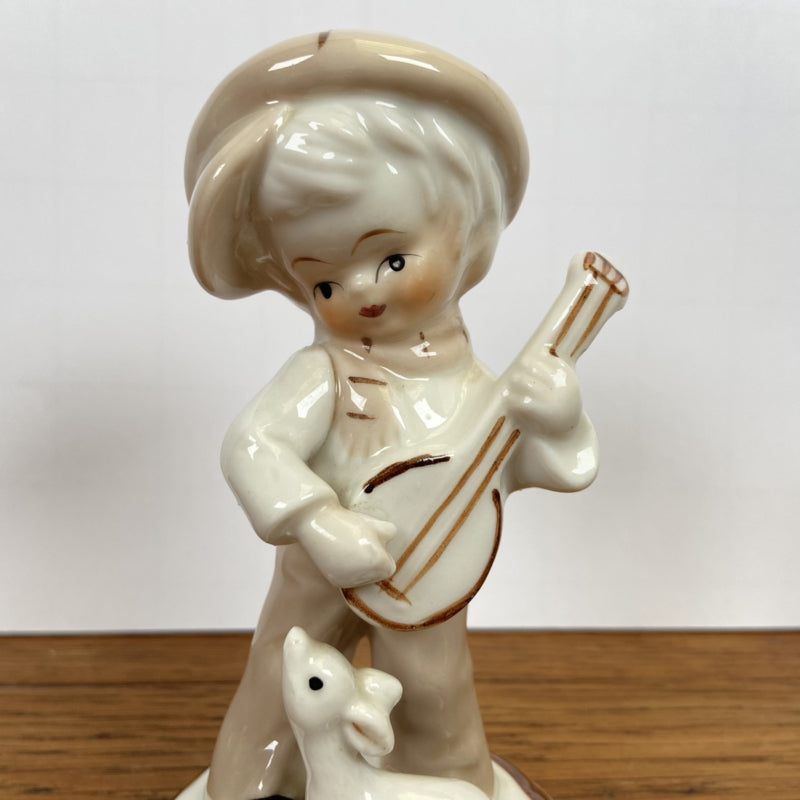 Vintage beeldje kindje met banjo