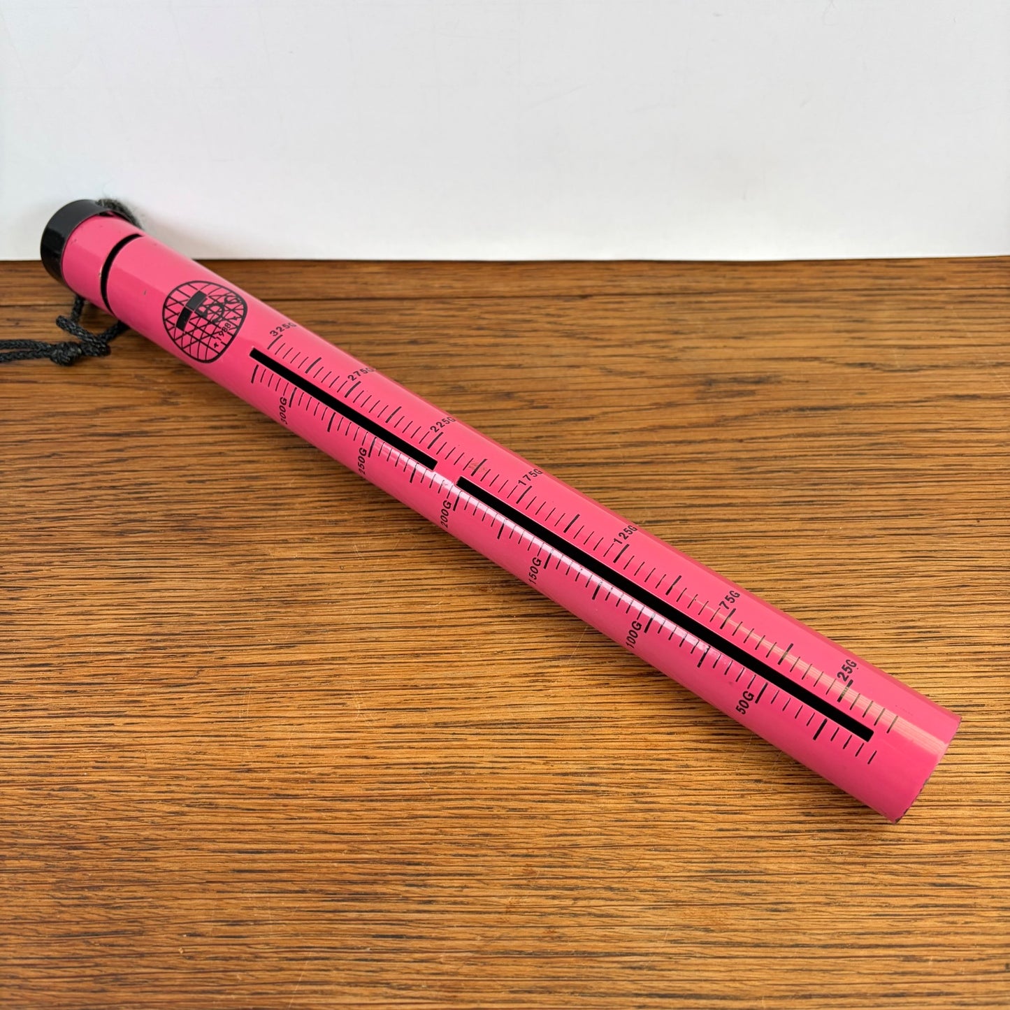 Vintage roze spaarpijp vijf gulden munten