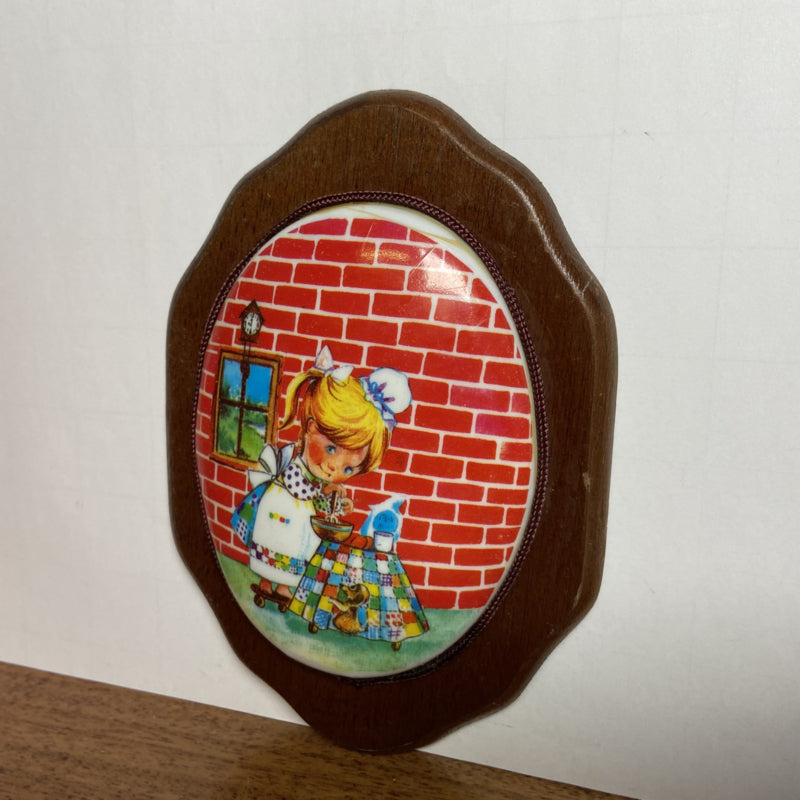 Vintage kunststof wandbordje