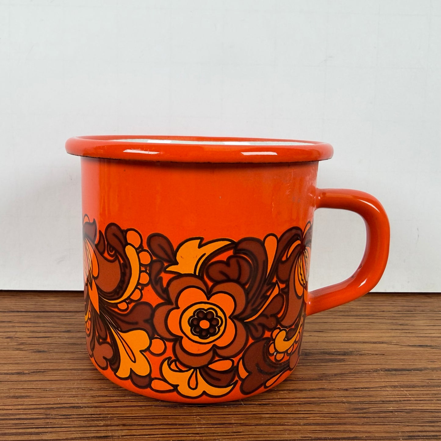Vintage oranje emaille beker