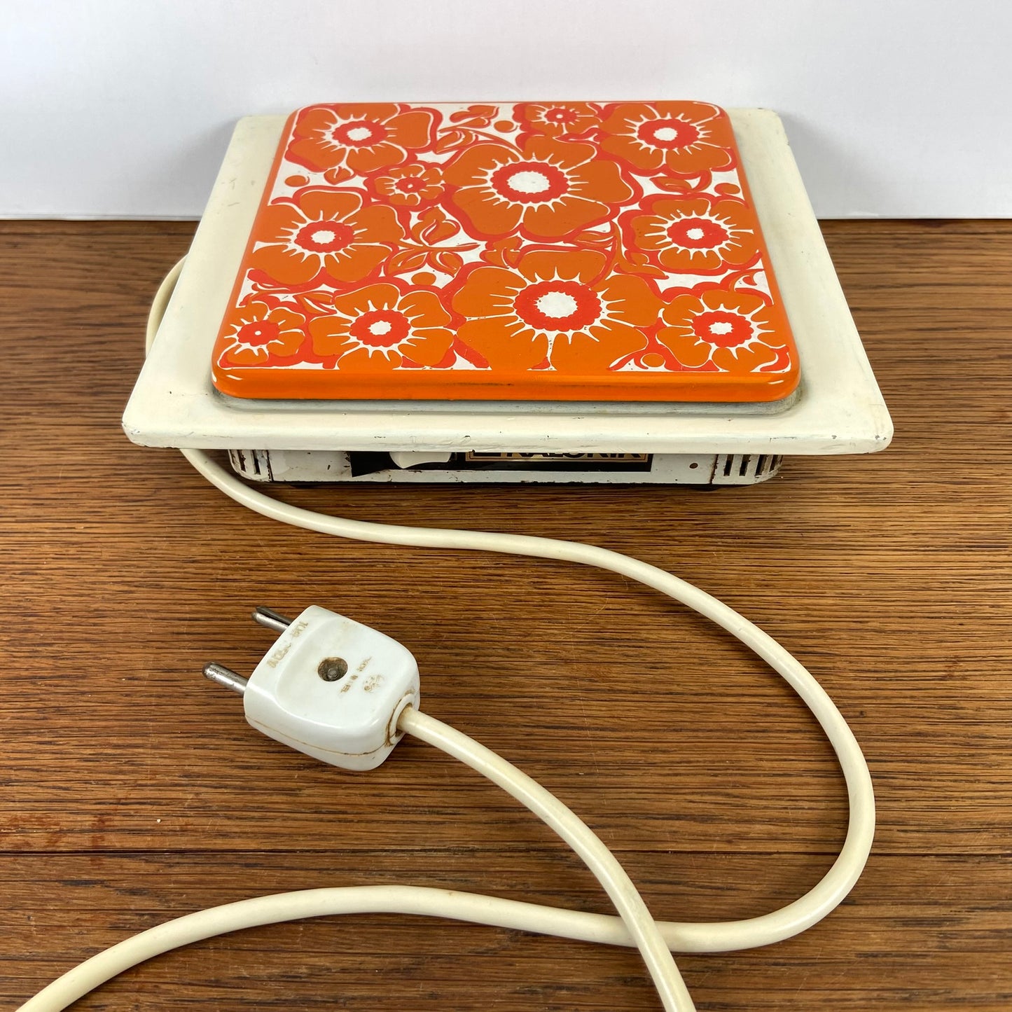 Vintage warmhoud plaatje oranje