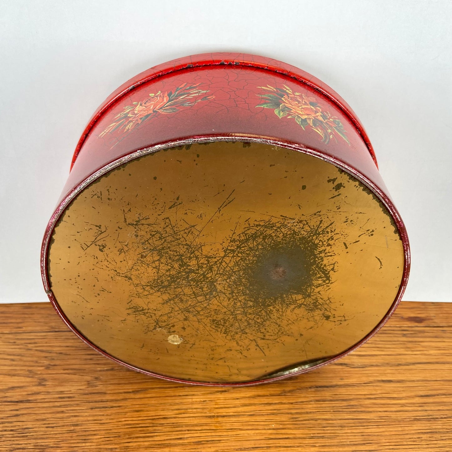 Vintage rond rood blik bloemen