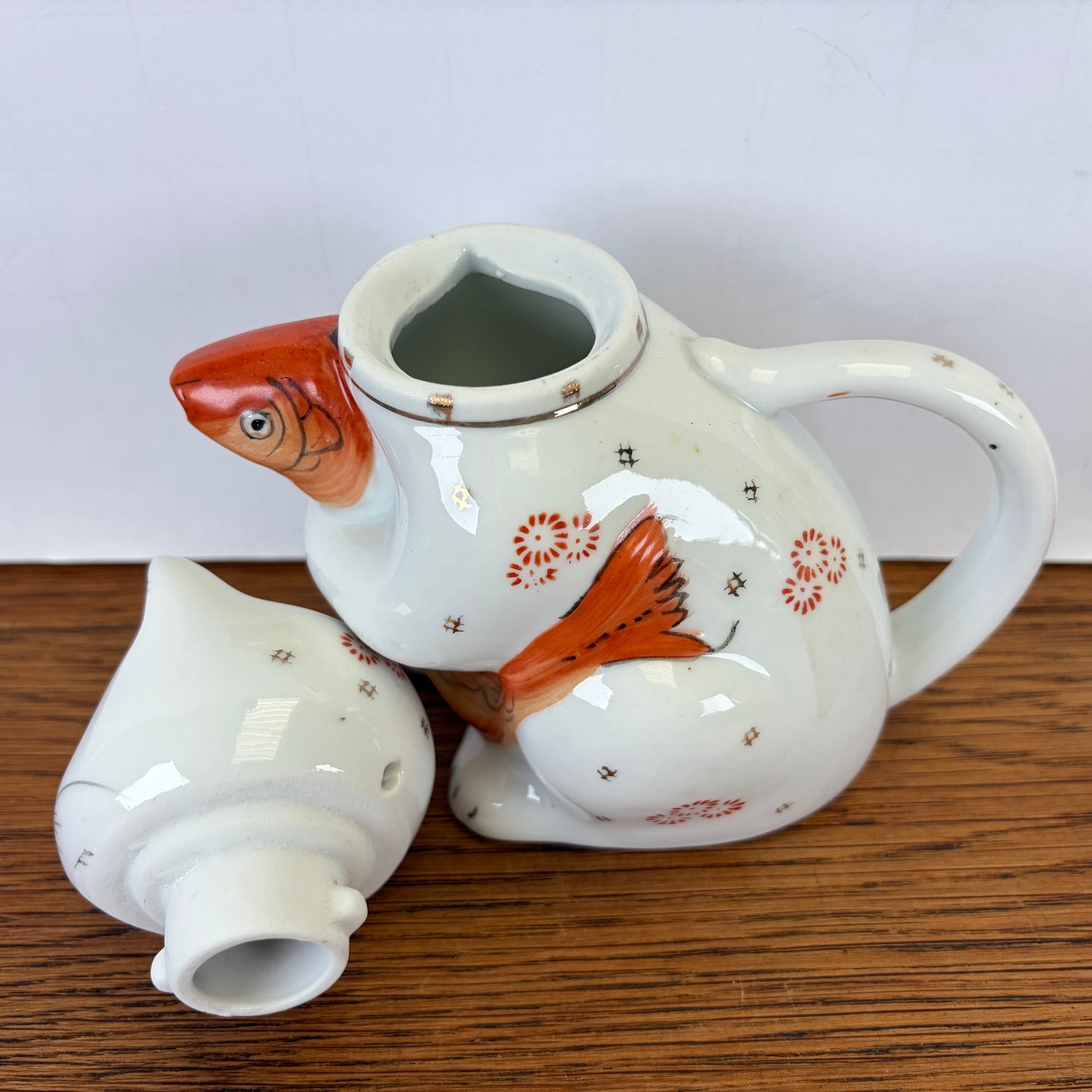 Vintage theepot kat met vis