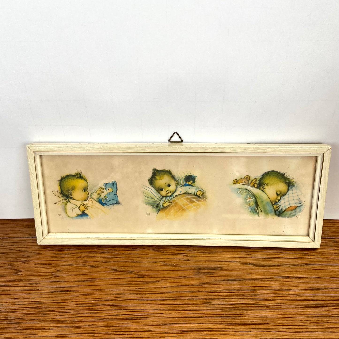 Vintage schilderijtje baby'tjes in bed