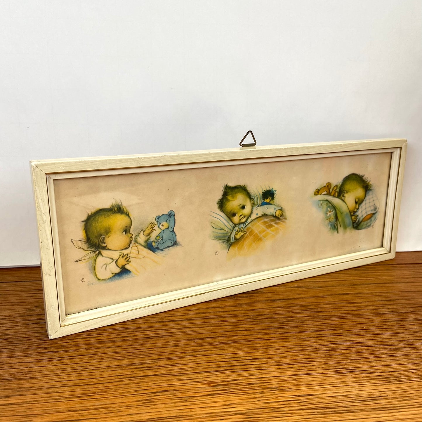 Vintage schilderijtje baby'tjes in bed
