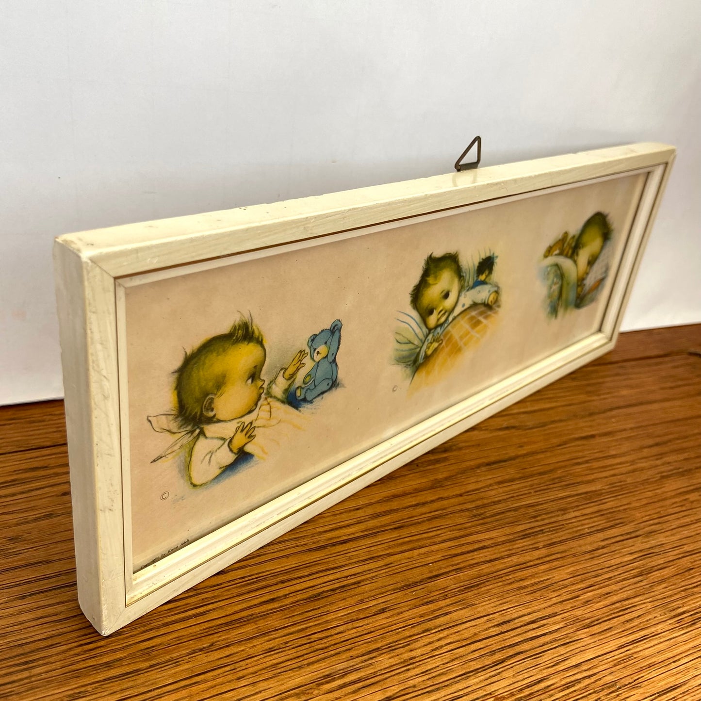 Vintage schilderijtje baby'tjes in bed