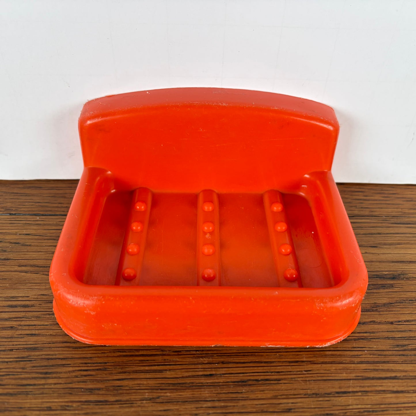 Vintage oranje zeepbakje