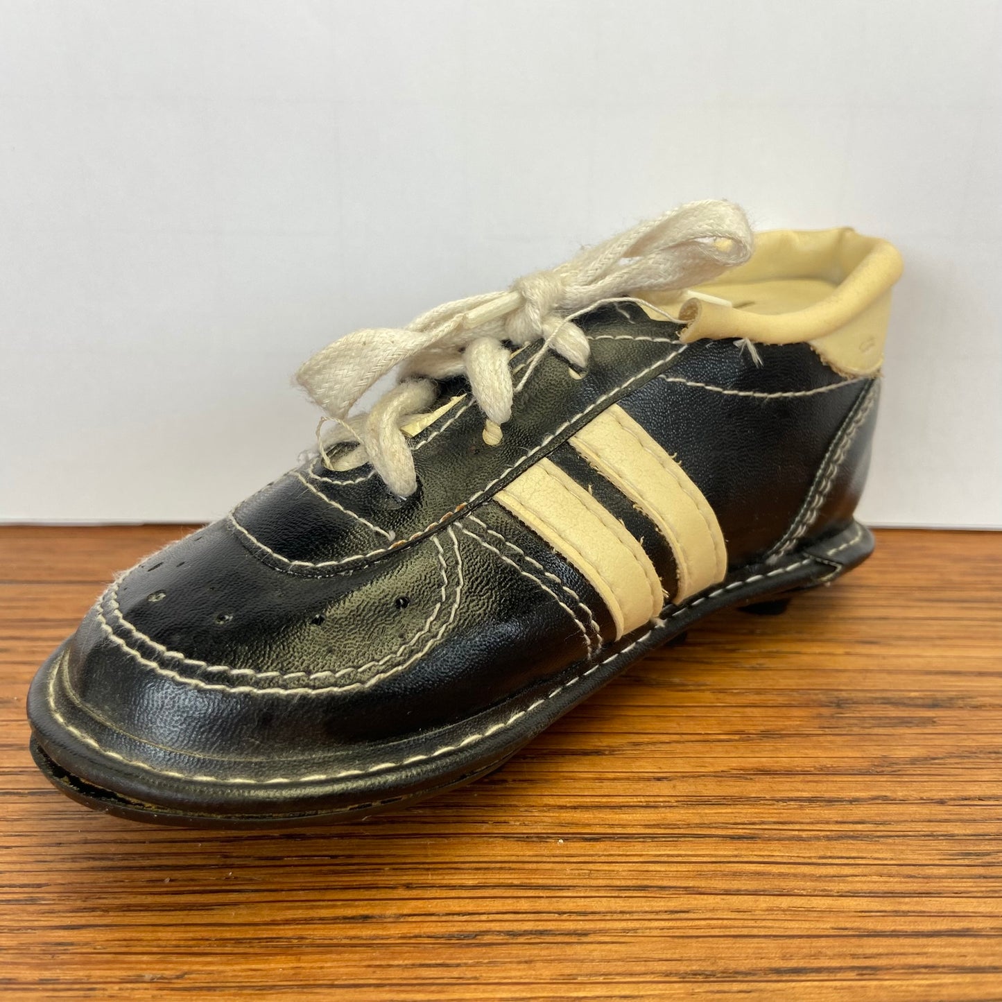 Vintage spaarpot voetbalschoen