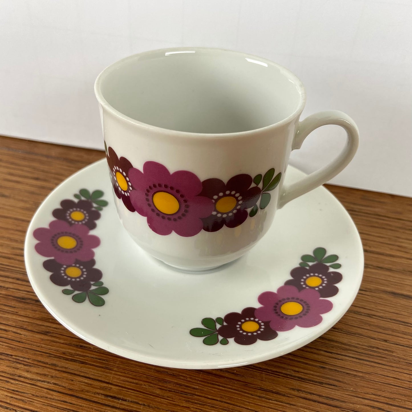 Vintage kop en schotel bloem