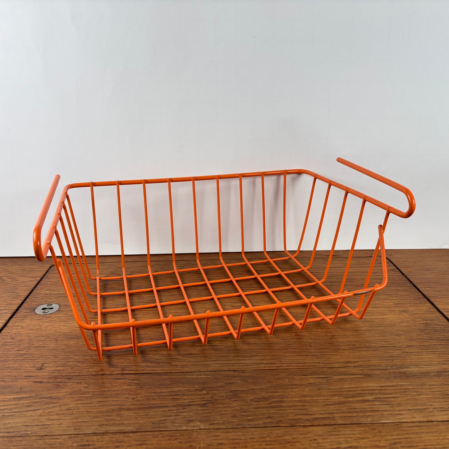 Vintage plastic draadmandje oranje