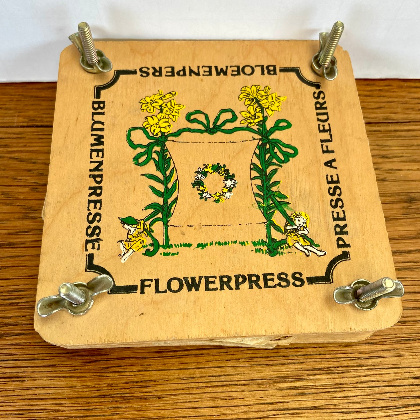 Vintage bloemenpers