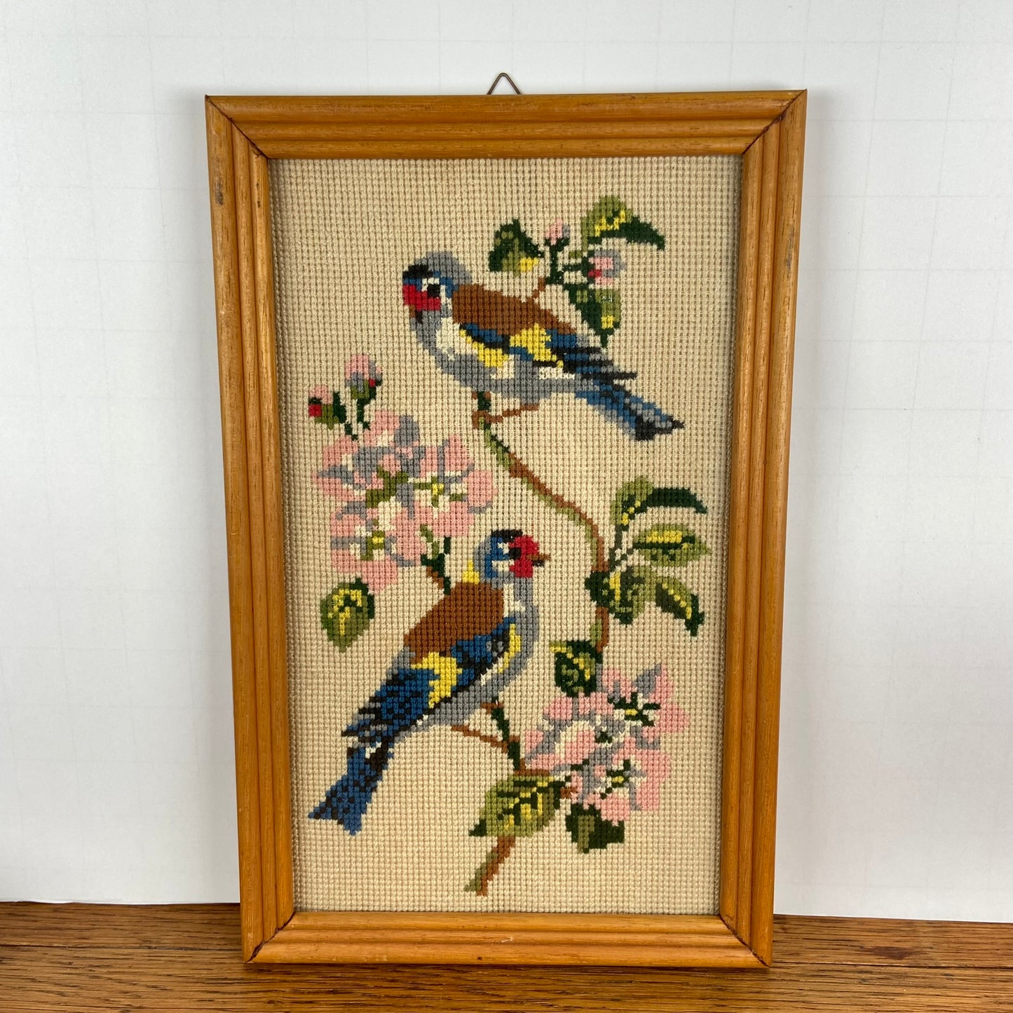 Geborduurde vogel prent