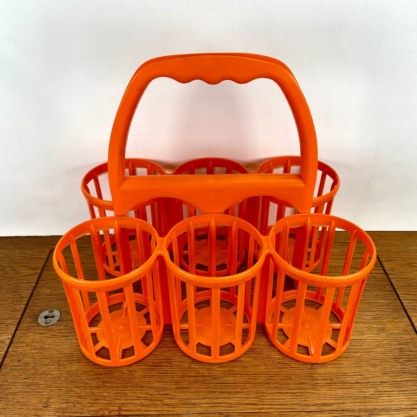 Vintage plastic flessenrek oranje