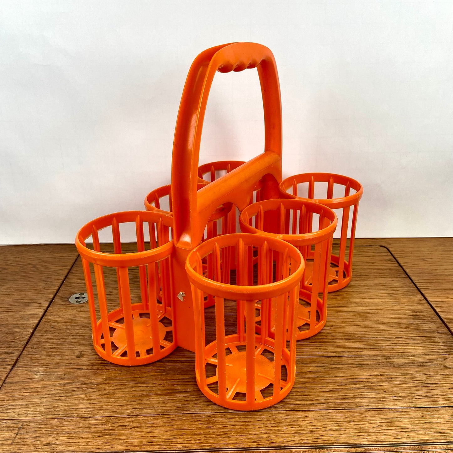 Vintage plastic flessenrek oranje