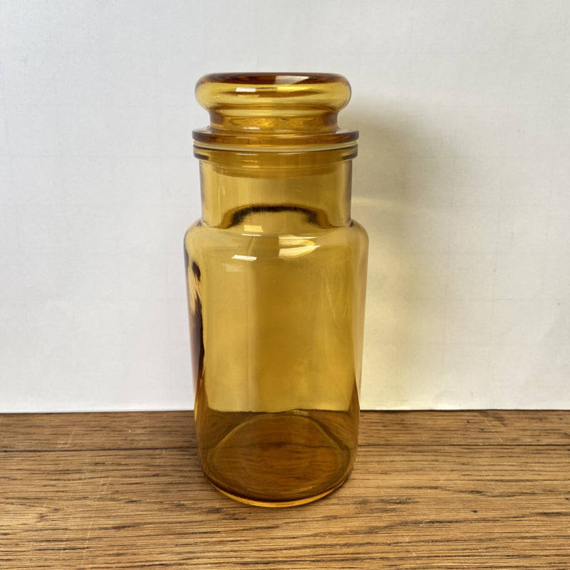 Okergele stopfles