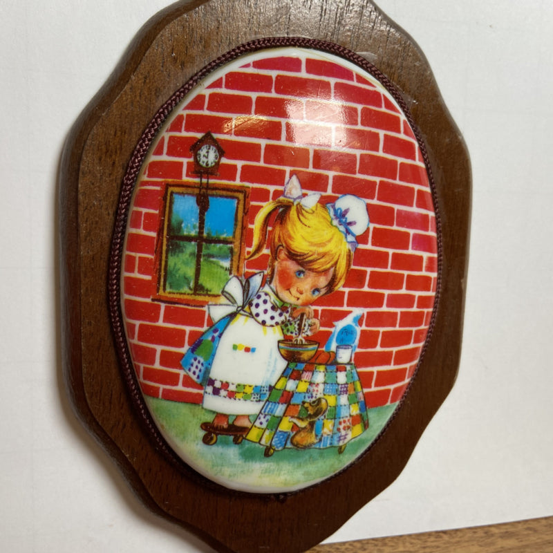 Vintage kunststof wandbordje
