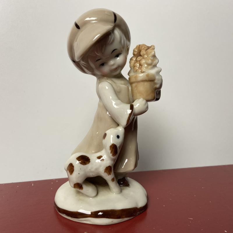 Meisje met hond en bloemen