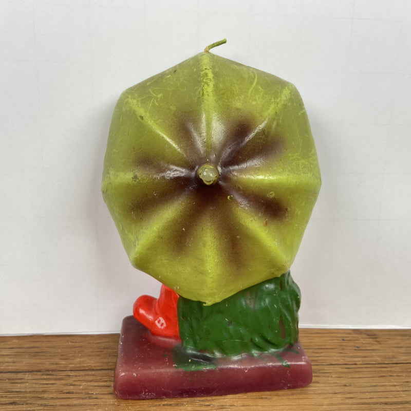 Vintage kaars meisje met paraplu