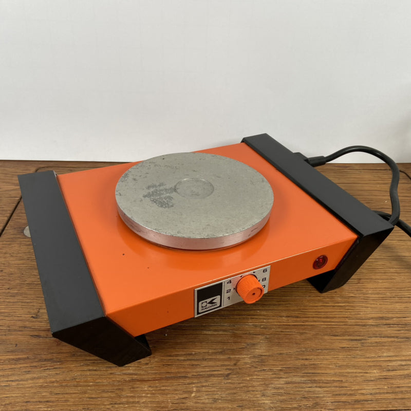 Oranje vintage warmhoudplaatje