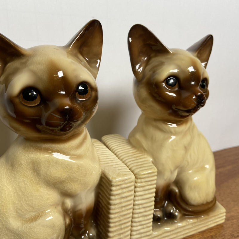 Vintage boekensteunen katten