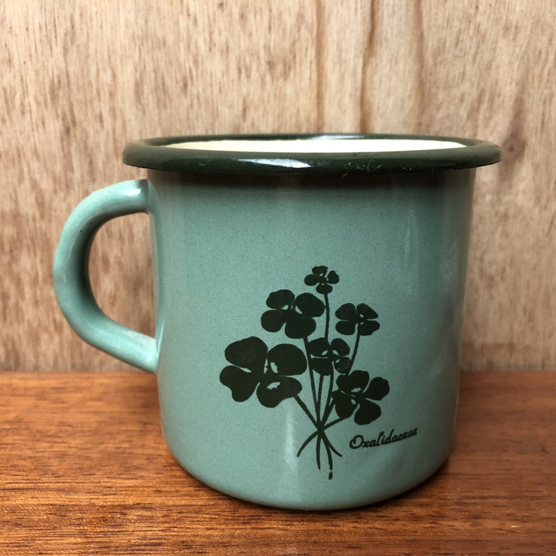 Groene emaille mok