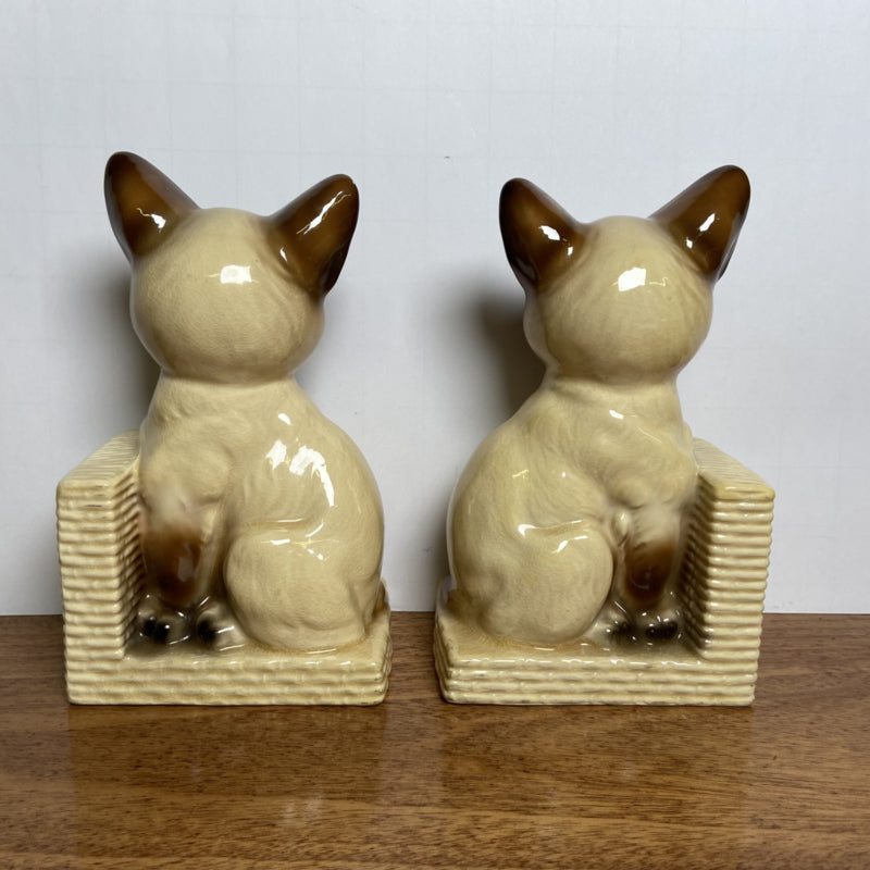 Vintage boekensteunen katten
