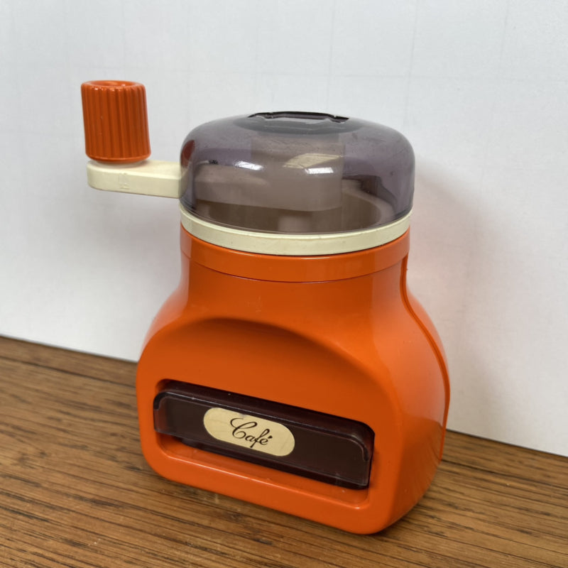Oranje koffiemolentje