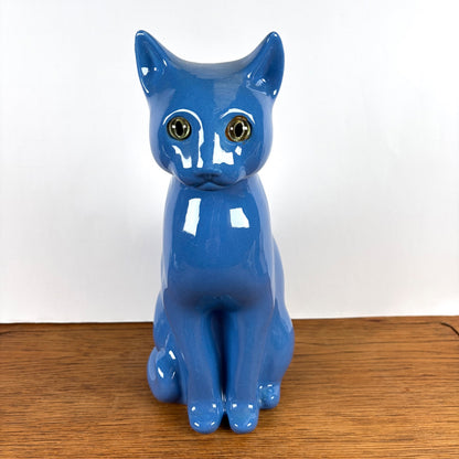 Vintage blauwe kat met groene ogen