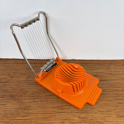 Vintage eiersnijder Beccon Plastics oranje