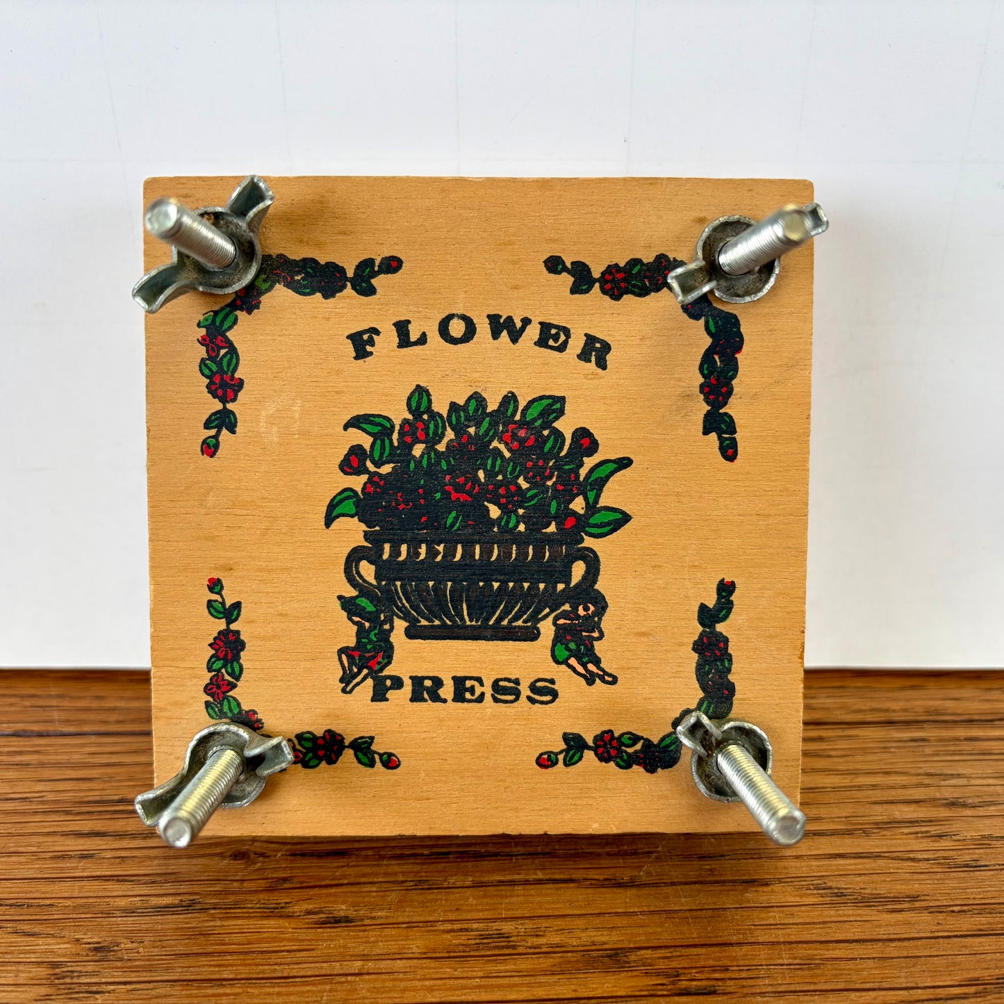 Kleine vintage bloemenpers