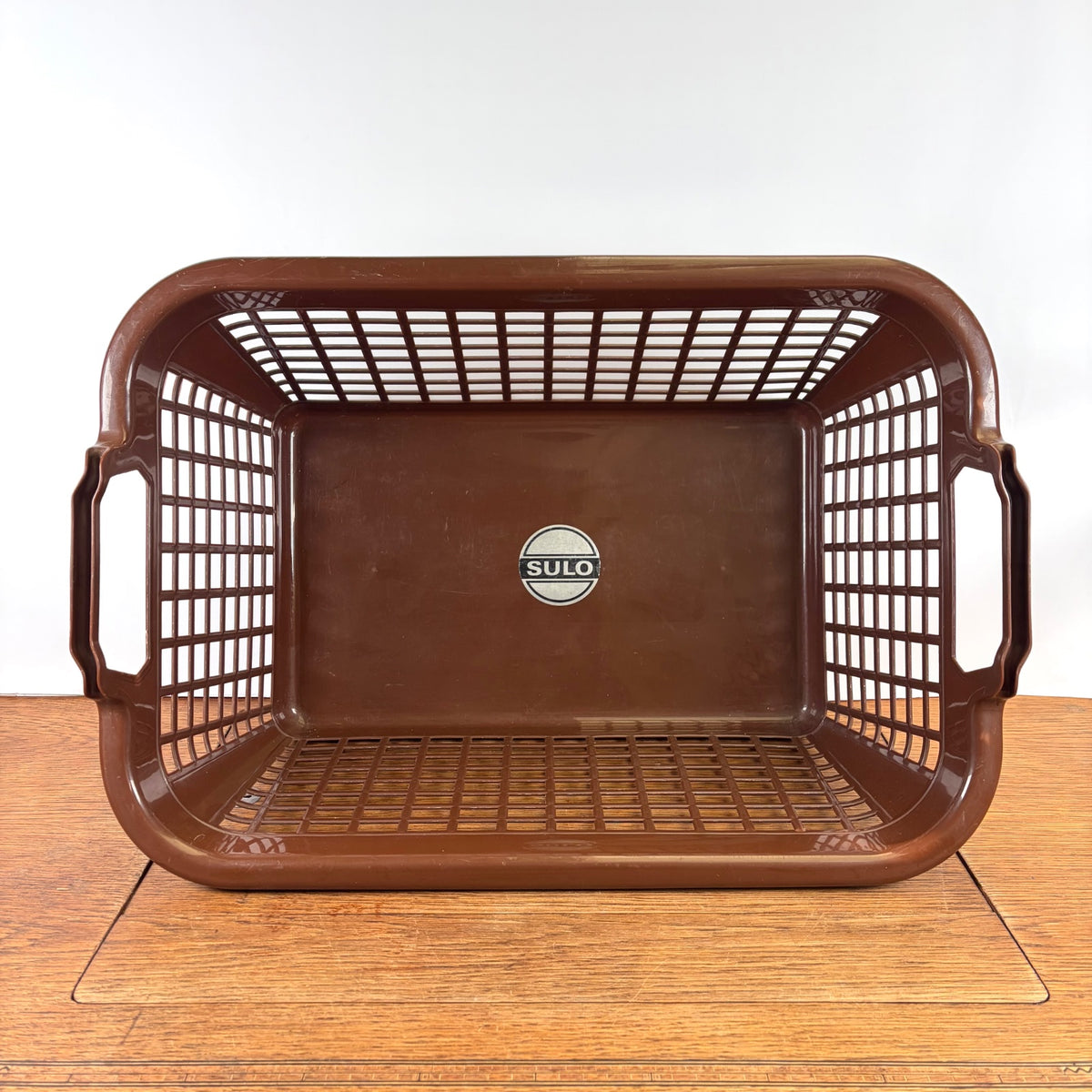 Vintage bruine plastic wasmand Sulo