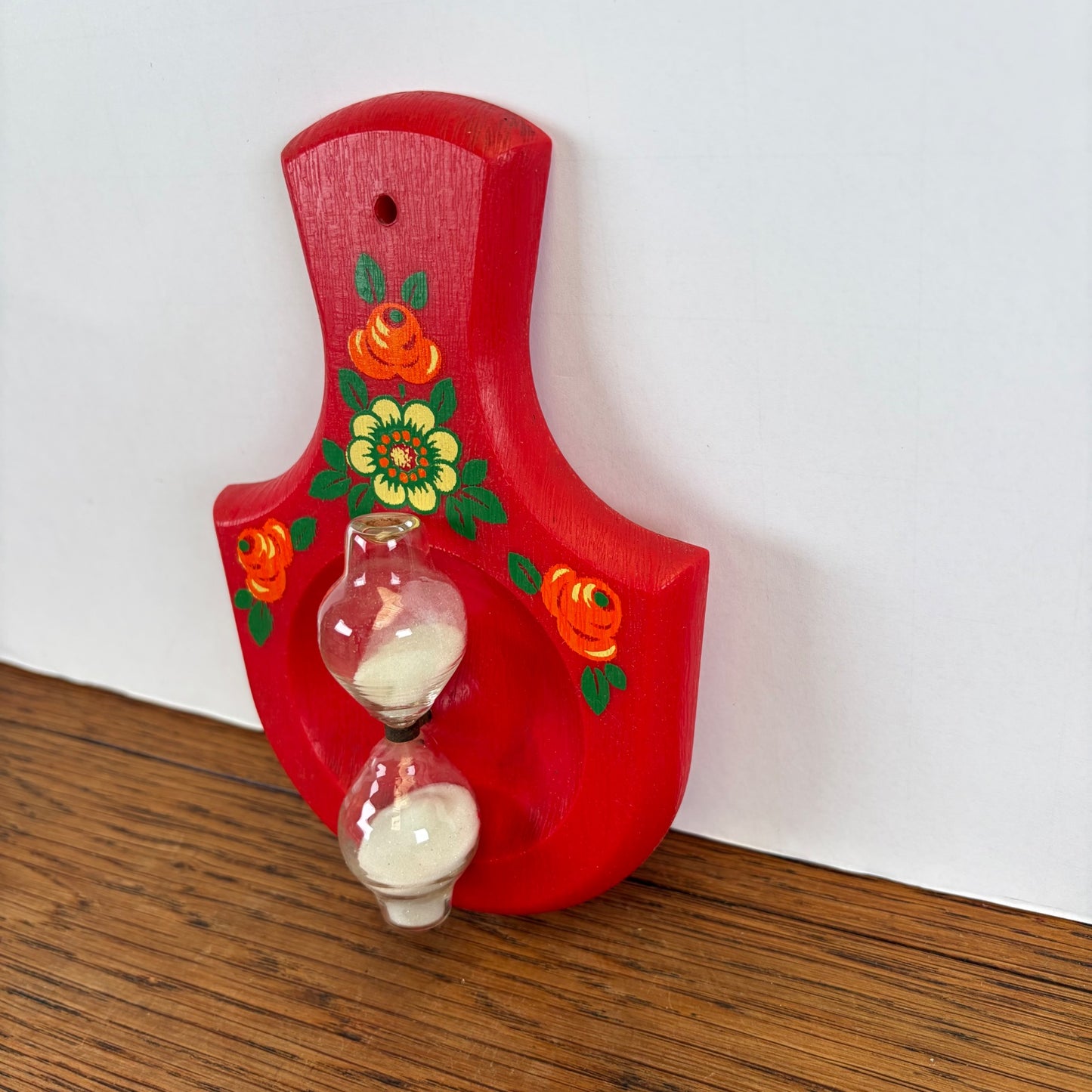 Vintage zandloper rood met bloemen