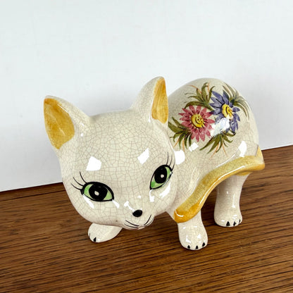 Vintage beeld kat met bloemen