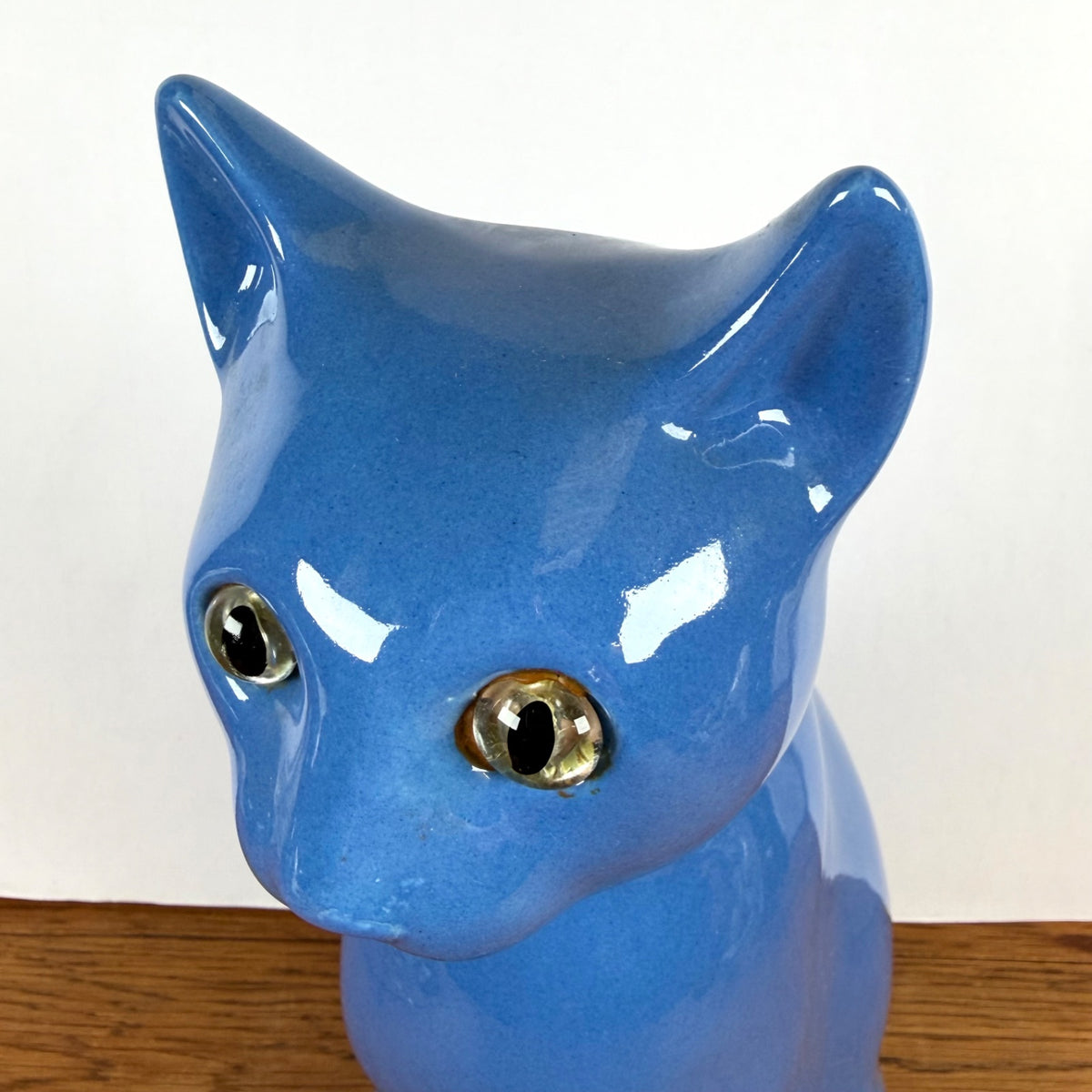 Vintage blauwe kat met groene ogen