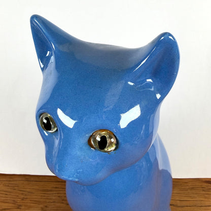 Vintage blauwe kat met groene ogen