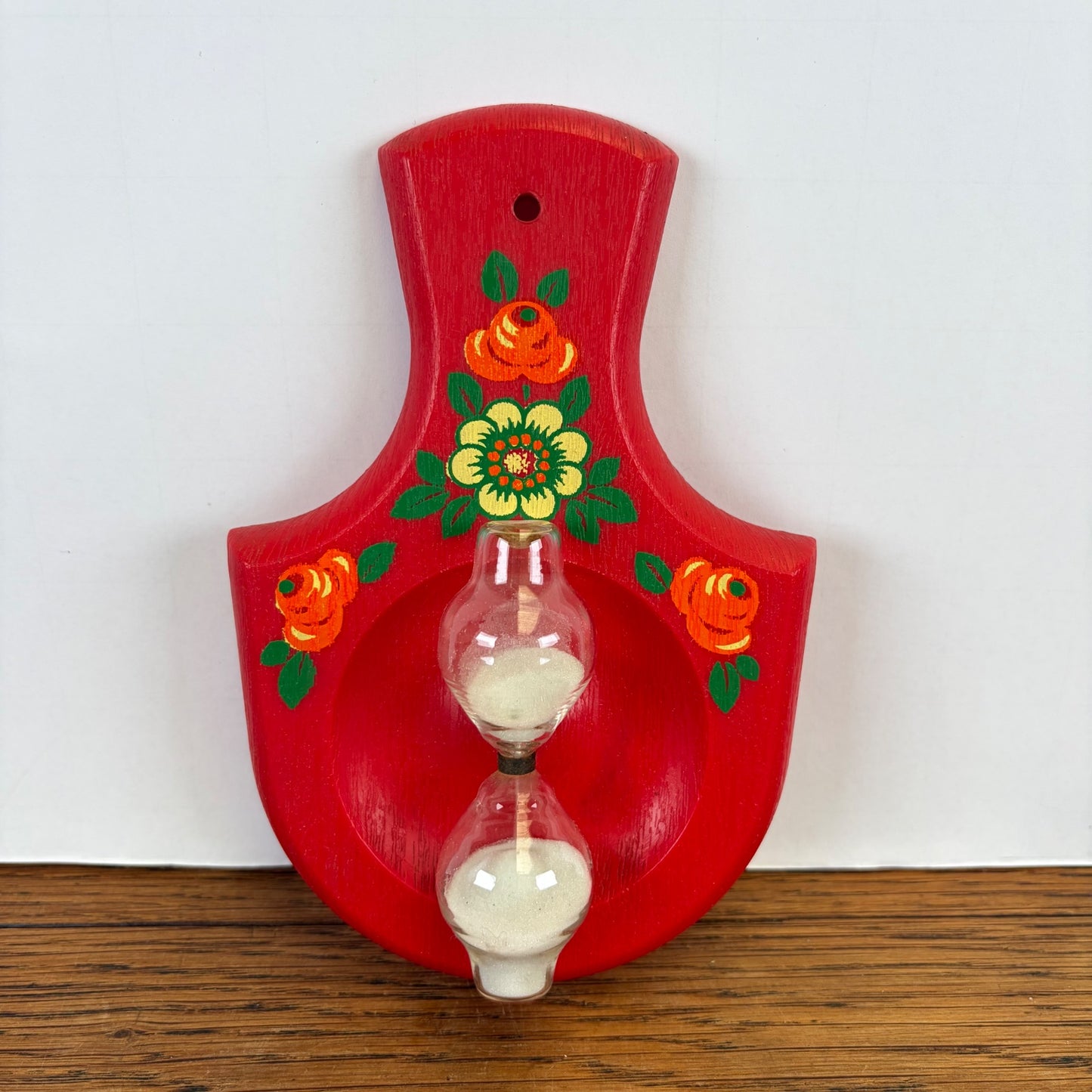 Vintage zandloper rood met bloemen