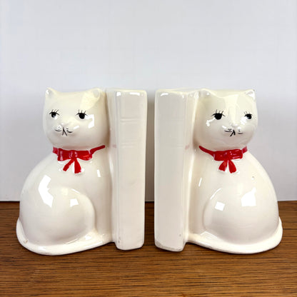 Vintage boekensteunen katten