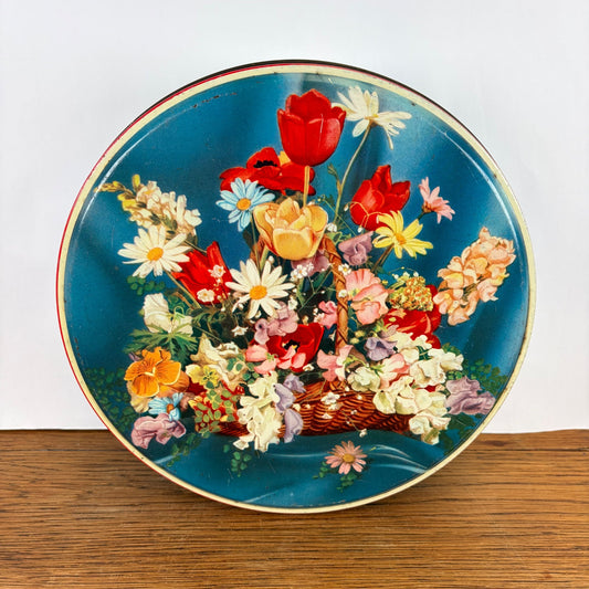 Vintage groot rond bloemenblik