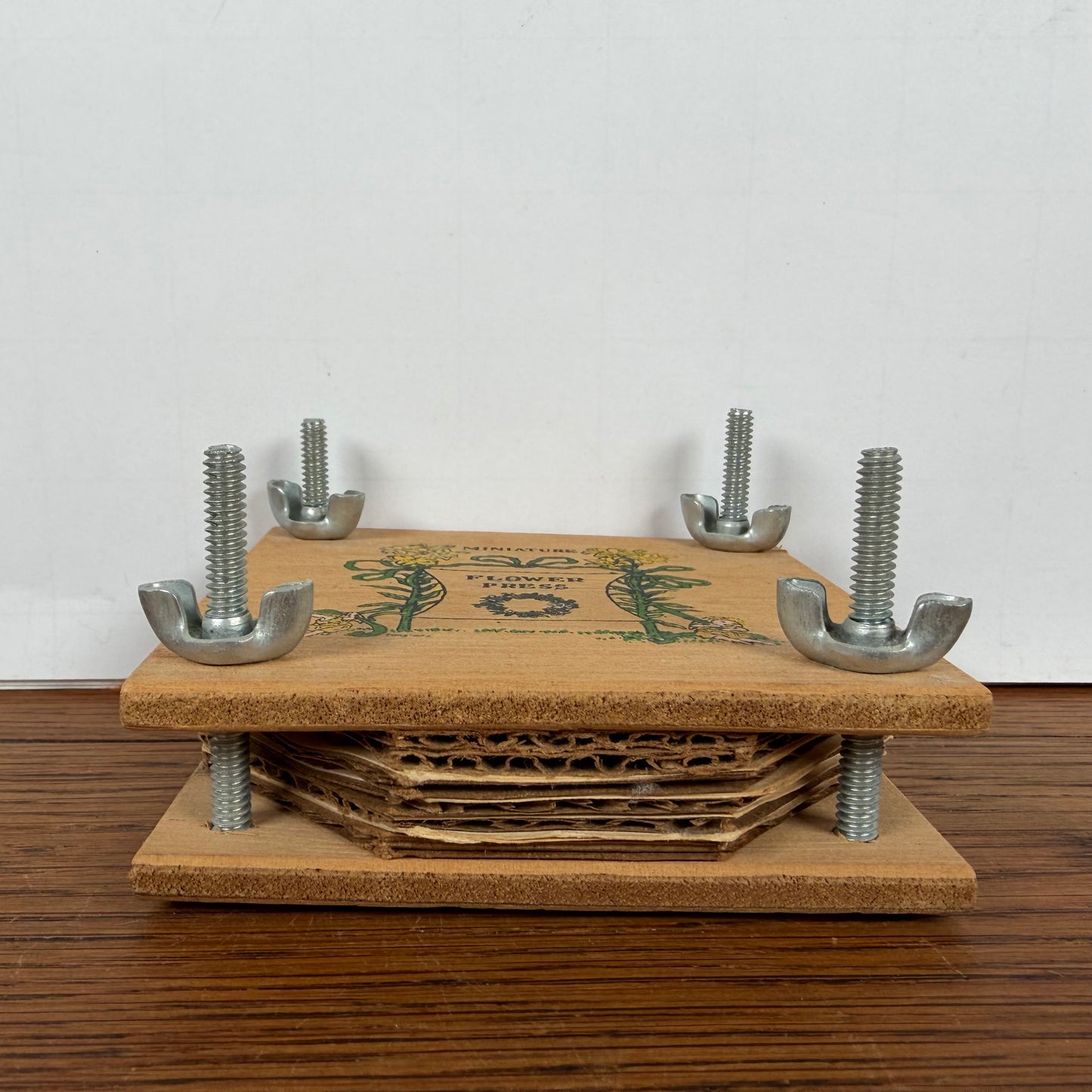 Kleine vintage bloemenpers