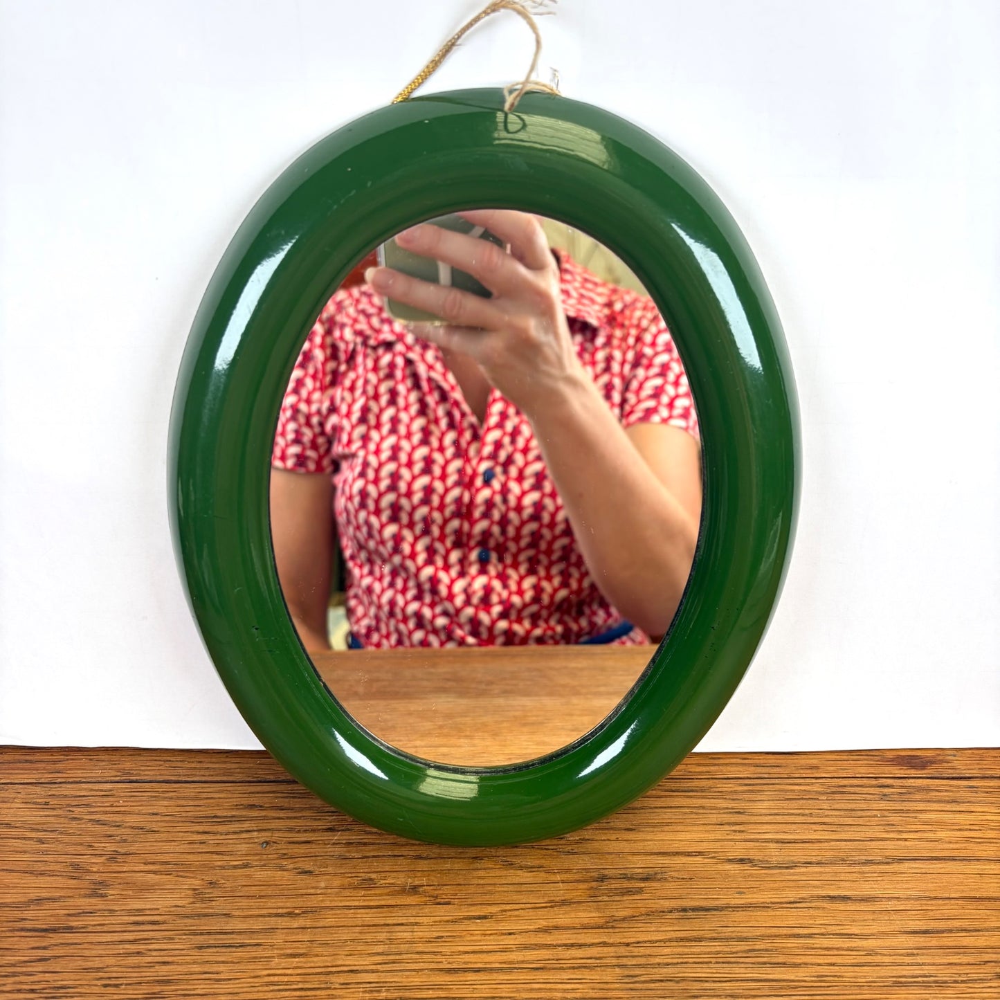 Vintage ovale spiegel groene kunststof lijst