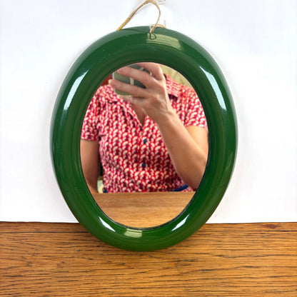 Vintage ovale spiegel groene kunststof lijst